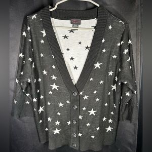 Torrid black cardigan size 1 with white star pattern.